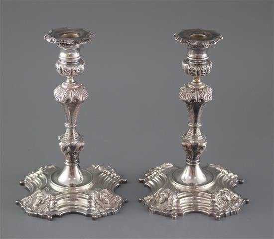 A pair of modern 18th century style Irish cast silver candlesticks, by Royal Irish Silver Co. Dublin, 1960, height 23.5cm, 69oz.